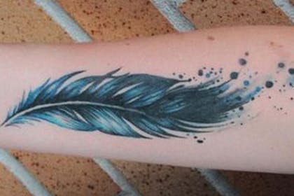 Blue feather tattoo