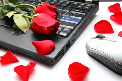 Laptop with rose petals