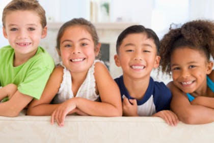 four children smiling