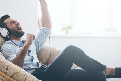 Man singing along to music