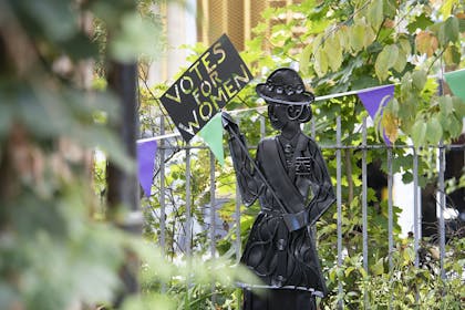 A 'votes for women' statue in the garden of the Pankhurst Centre in Manchester