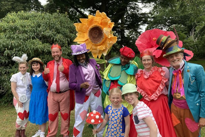 The cast of Alice in Wonderland at Kew Gardens plus my 9 year old and 5 year old. Image: author's own