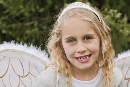 Girl dressed as a nativity angel
