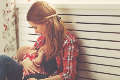 Woman breastfeeding baby