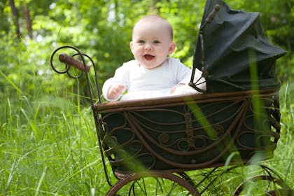 baby in old-fashioned pram