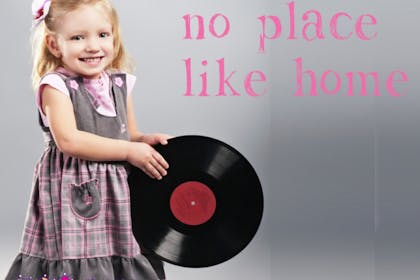 little girl holding vinyl record