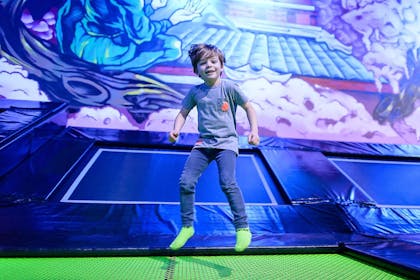young boy bouncing on trampoline at Flip Out park in Brent Cross