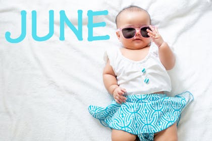 Baby girl in sunglasses - June