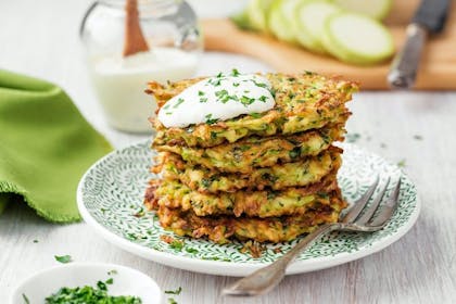 Courgette pancakes with herbs and yoghurt