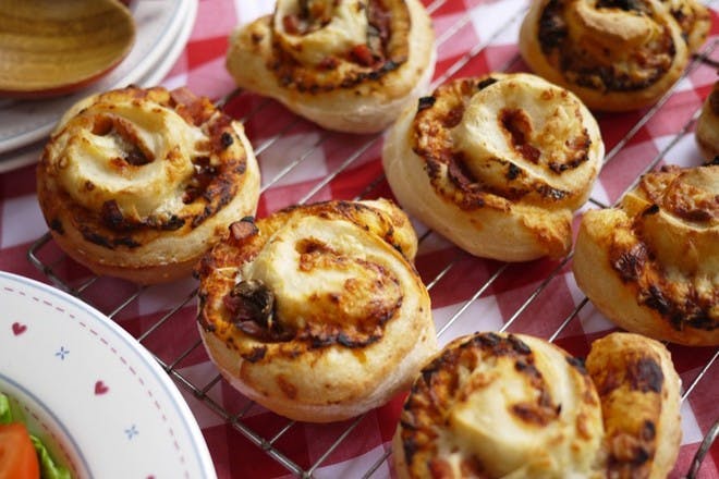 Pizza whirls on a cooling rack