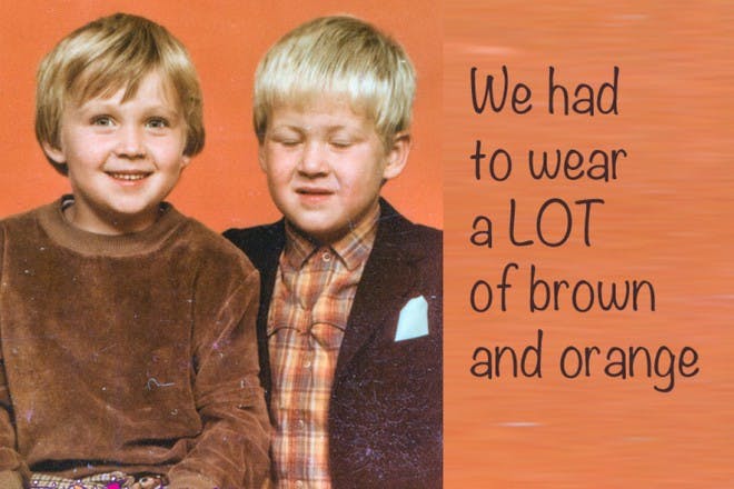 two boys wearing brown and orange