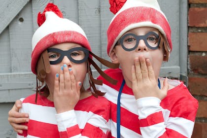 Two kids dressed in Where's Wally costume