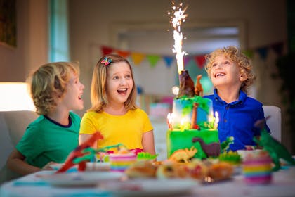 Birthday cake with erupting volcano on top