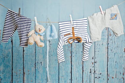 baby clothes hanging on a line