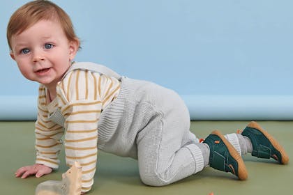 toddler crawling in shoes