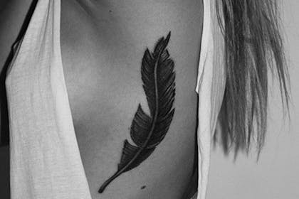 feather tattoos on back