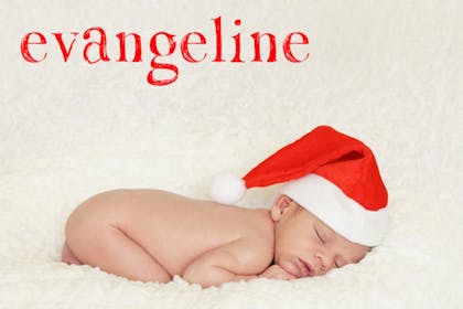 Baby sleeping in Christmas Santa hat