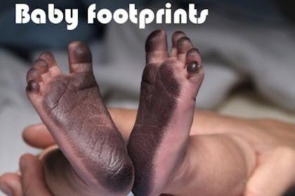 baby feet with ink on them