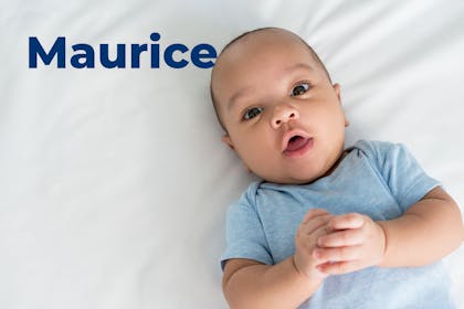 Baby in blue baby gro. Name Maurice written in text