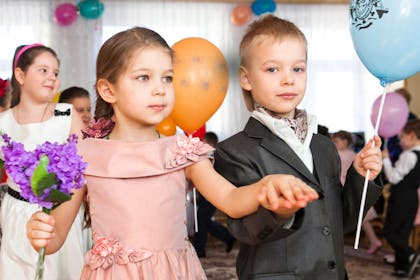 Kids dressed in formal party wear