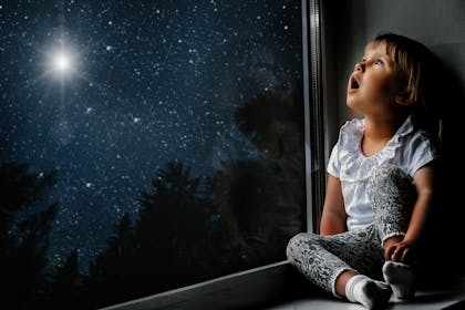 Girl looking at stars