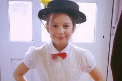 Girl dressed in Mary Poppins costume
