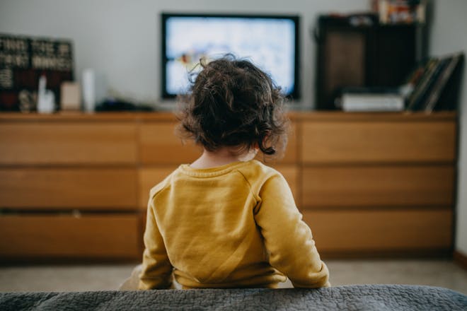 young child watching TV