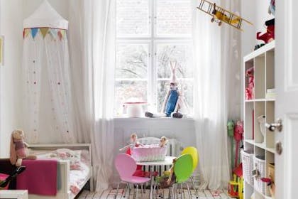 Girl's bedroom with colourful bunting