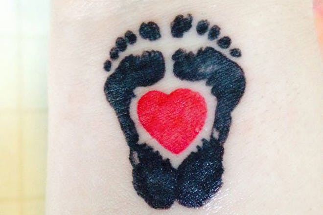 Footprints and heart miscarriage tattoo