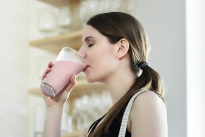 Woman drinking smoothie on Cambridge diet