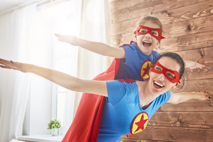 Mum and daughter dressed up as super heroes