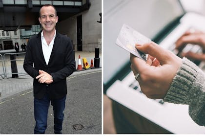 A man in the street and a woman holding a credit card