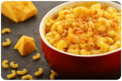 macaroni cheese in red bowl