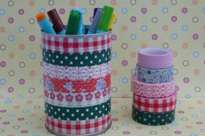 colourful and patterned storage tin with sharpie markers inside it