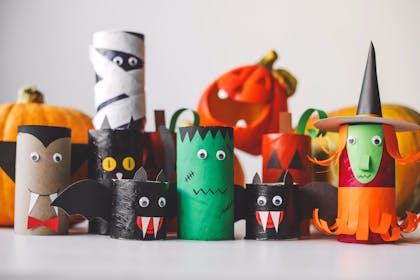 Cardboard toilet roll tubes turned into Halloween monsters by craft activity