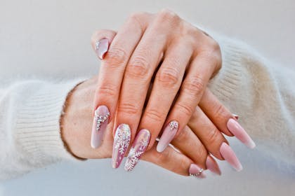 11. Pink snowflake nails