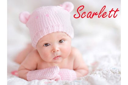 baby in pink hat