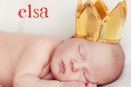 Sleeping baby wearing a gold crown
