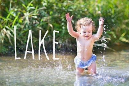 baby playing in water - Lake baby name