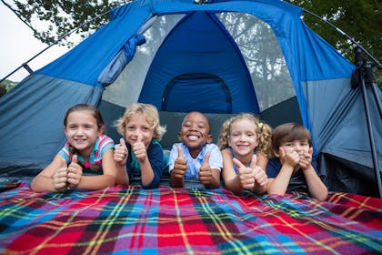 Five kids in a tent
