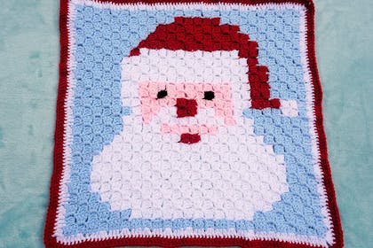 Hand-crocheted Christmas Santa blanket