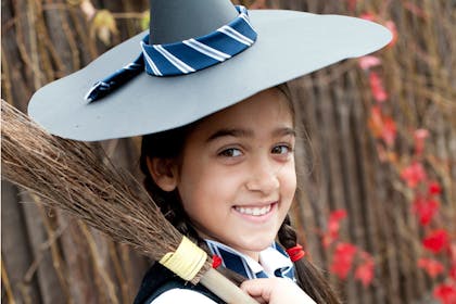A girl dressed as The Worst Witch