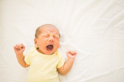 2 week old baby yawning