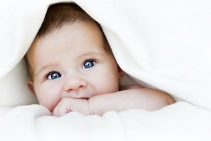 Close up of baby with blue eyes 