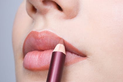 2. Applying striking lip liner