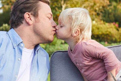 Jamie Oliver kissing son