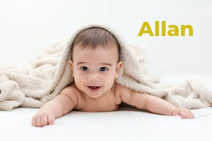Baby with beige blanket. Name Allan written in text