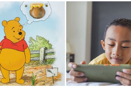 Winnie the Pooh / boy using tablet