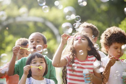 Kids blowing bubbles