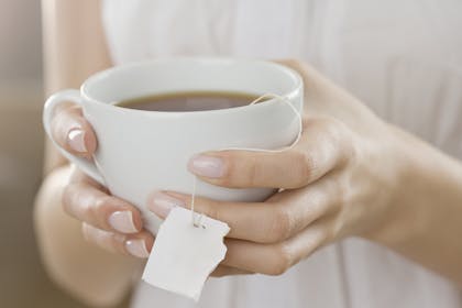 Woman holding tea